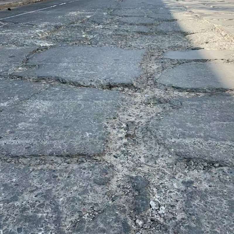兴隆台路面起砂露石子修补料
